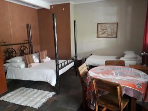 Кровать или кровати в номере Puccini House
