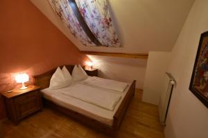 Postel nebo postele na pokoji v ubytování Haus Verdi