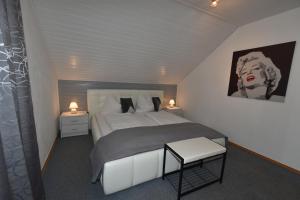 Postel nebo postele na pokoji v ubytování Haus Verdi
