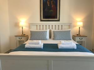 Кровать или кровати в номере Bettola Del Re Capri Home boutique b&b
