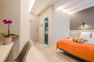 Cama o camas de una habitación en Mandarina Hotel Luxembourg Strassen