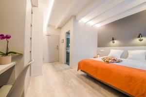 Cama o camas de una habitación en Mandarina Hotel Luxembourg Strassen