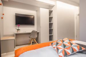 Cama o camas de una habitación en Mandarina Hotel Luxembourg Strassen
