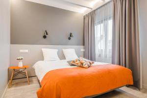 Cama o camas de una habitación en Mandarina Hotel Luxembourg Strassen