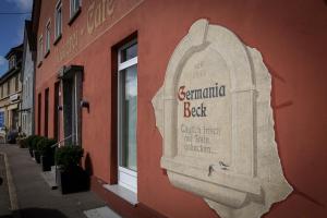 a sign on the side of a building at Germania Beck in Hülben