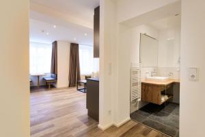 Kúpeľňa v ubytovaní Kaiser Max Design Appartements