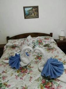 En eller flere senge i et værelse på Hotel Zingaro + 7 billeder