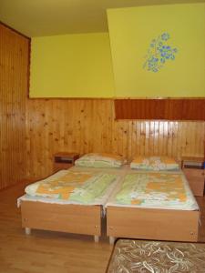 Posteľ alebo postele v izbe v ubytovaní Pokoje Zakopane
