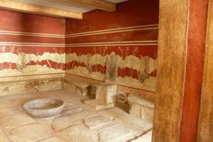 a bathroom with a toilet in the corner of a room at House in Organic Farm in Apóstoloi +21 photos