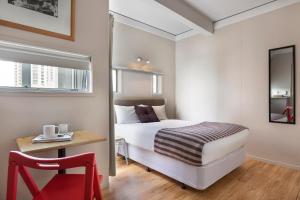Postel nebo postele na pokoji v ubytování ibis budget Auckland Central