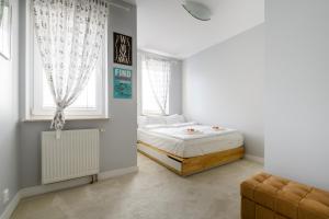 Apartament Ursynów Alternatywyにあるベッド