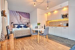 Kuchyňa alebo kuchynka v ubytovaní Tartaczna Deluxe Apartments Gdansk
