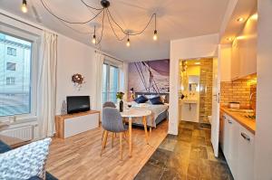 Kuchyňa alebo kuchynka v ubytovaní Tartaczna Deluxe Apartments Gdansk