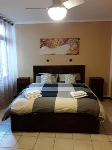 Postel nebo postele na pokoji v ubytování Camere Porto Vecchio con parcheggio a pochi passi dal castello