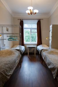 a room with two bunk beds and a window at Все Сезоны / All Seasons in Saint Petersburg