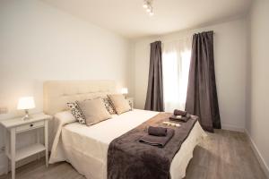 Katil atau katil-katil dalam bilik di Flower Beach Suite 7 +13 gambar