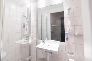 Koupelna v ubytování Smarthotel Tromsø + 25 fotografií