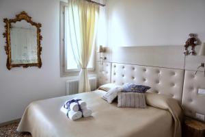 Cama ou camas em um quarto em B&B Al Pozzo di Luce