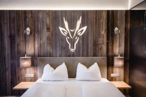 Łóżko lub łóżka w pokoju w obiekcie Hotel Gerl