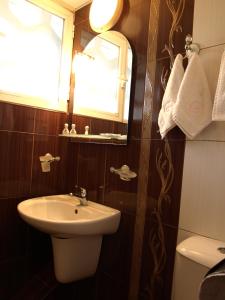 Koupelna v ubytování Bononia Hotel