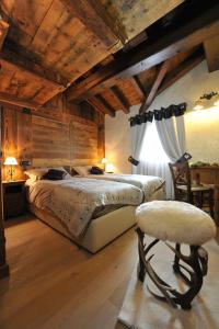 Postel nebo postele na pokoji v ubytování Affittacamere Petit Coeur