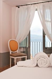 Postel nebo postele na pokoji v ubytování La Salina Hotel Borgo Di Mare