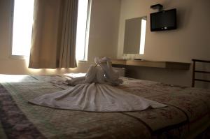 Crigial Hotel客房内的一张或多张床位