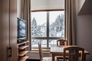 Nespecifikovaný výhled na hory nebo výhled na hory při pohledu z apartmánu
