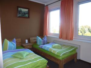 Cama o camas de una habitación en Pension Märkische Bauernstube