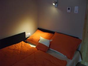 Anikó Apartmanにあるベッド