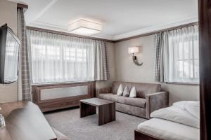 Χώρος καθιστικού στο Hotel Garni Caroline +34 φωτογραφίες