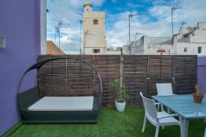 Patio alebo iná vonkajšia časť ubytovania Atico soleado y céntrico