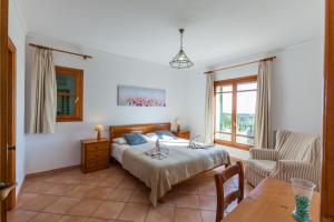 Postel nebo postele na pokoji v ubytování Es Serral