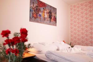 Postel nebo postele na pokoji v ubytování Hotel Medlov