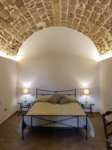 Voodi või voodid majutusasutuse B&B Macrina toas