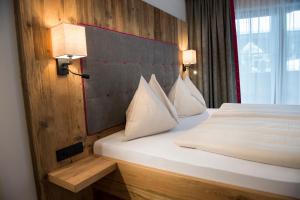 Postel nebo postele na pokoji v ubytování Hotel Sendlhof