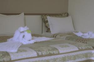 Crigial Hotel客房内的一张或多张床位