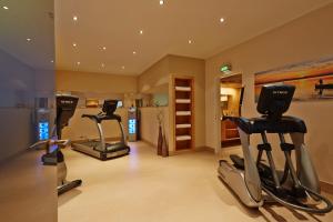 a gym with two exercise bikes in a room at Sunday Hotel Hannover in Hannover