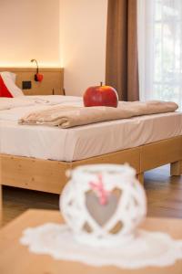Postel nebo postele na pokoji v ubytování Bio Agritur Le Millemele