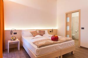 Postel nebo postele na pokoji v ubytování Bio Agritur Le Millemele