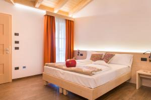 Postel nebo postele na pokoji v ubytování Bio Agritur Le Millemele