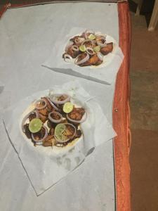 two pizzas sitting on top of a table at Jamrung Hillside Camping in Jambrung 