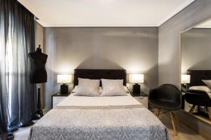 Postel nebo postele na pokoji v ubytování Holi-Rent Gran Poder