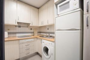 Kuchyň nebo kuchyňský kout v ubytování Holi-Rent Gran Poder