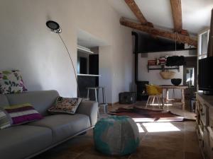 A seating area at PROVENCEguesthouse L'Agaçon