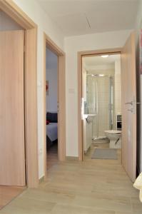 Koupelna v ubytování Jasmina Apartment + 27 fotografií