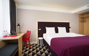 Cama o camas de una habitación en AZIMUT Hotel Ufa