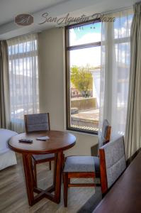 A seating area at Hotel San Agustin Plaza