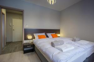 Łóżko lub łóżka w pokoju w obiekcie Villa Mountain View Apartamenty