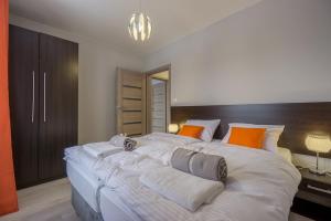 Łóżko lub łóżka w pokoju w obiekcie Villa Mountain View Apartamenty